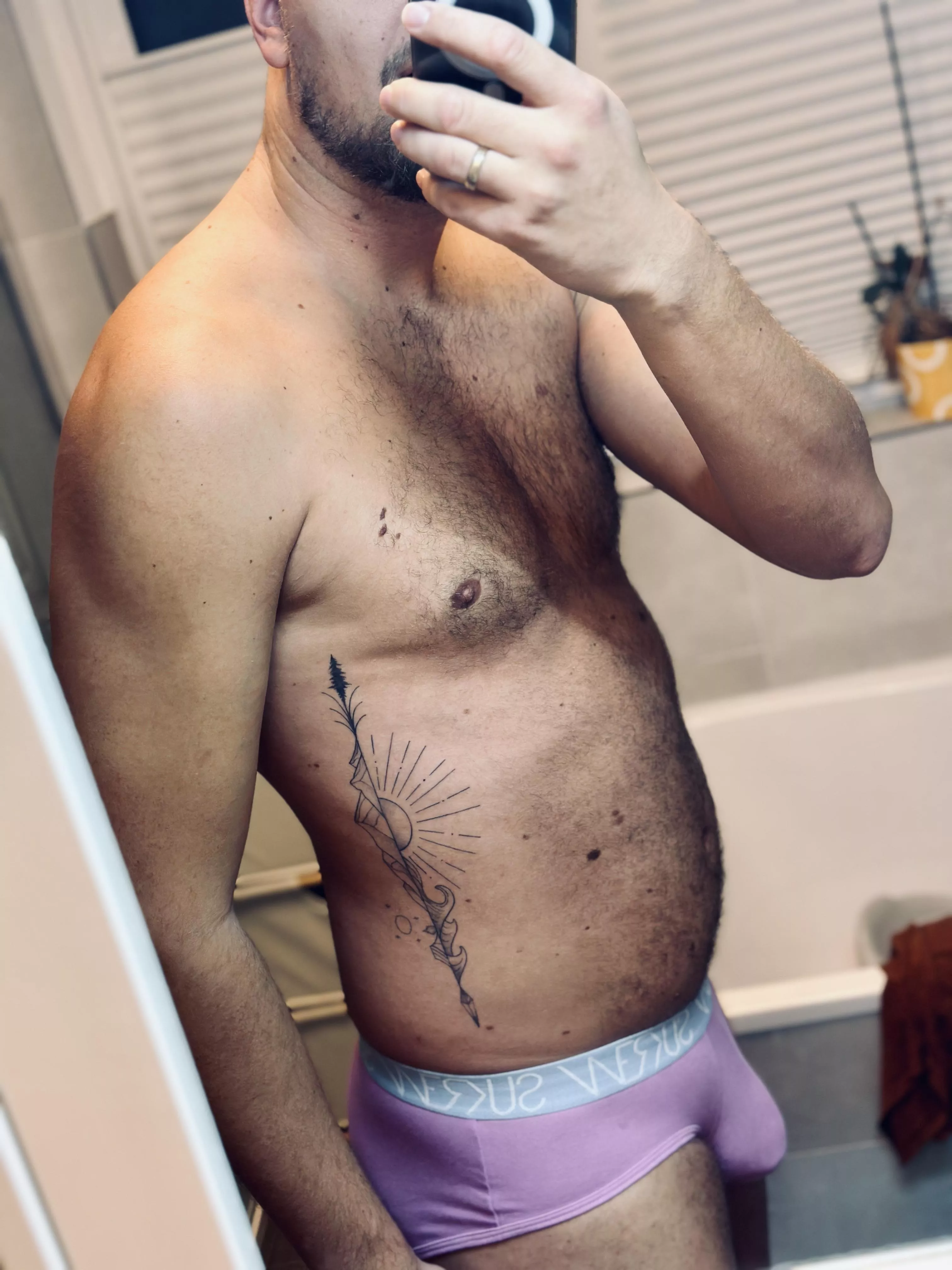 Anybody into a hairy guy with tattoos?