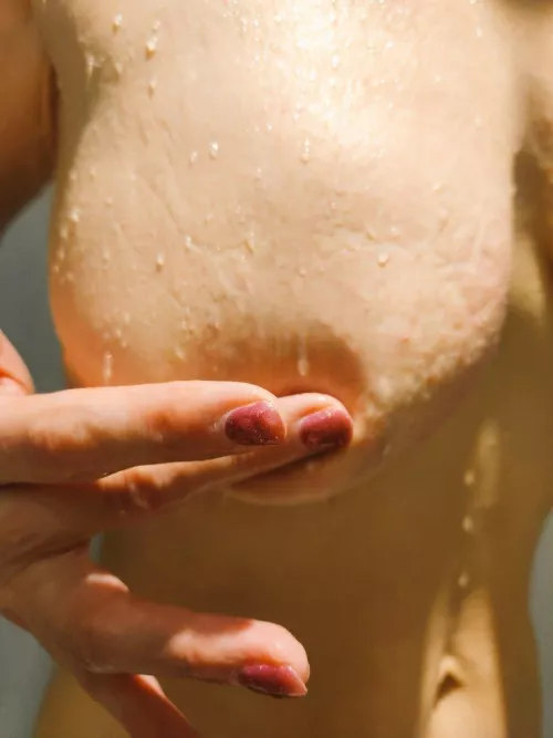 Rubbing my nipple in the shower today