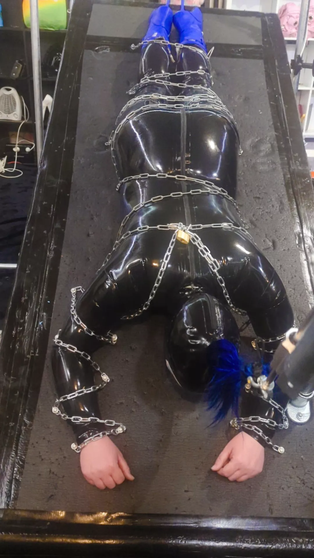 Shiny latex, hella chains, hair pulling machine!
