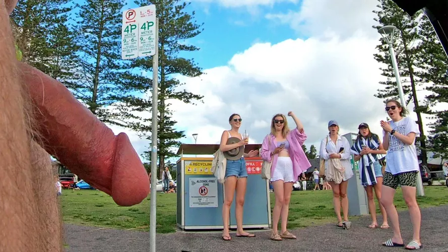 Girls give cheering CFNM reaction to public erection on the street at WNBR.
