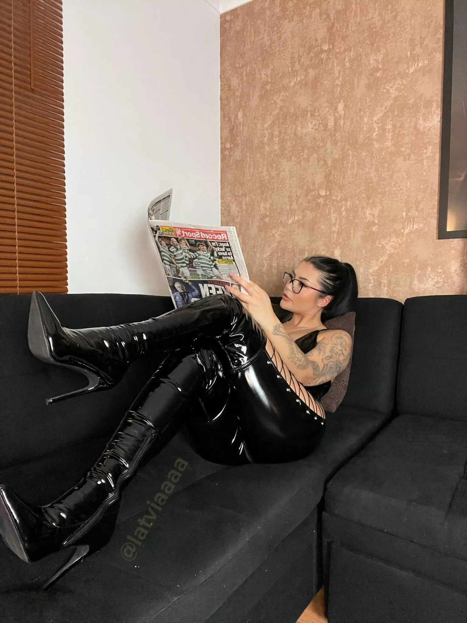 Do I look sexy reading the newspaper?