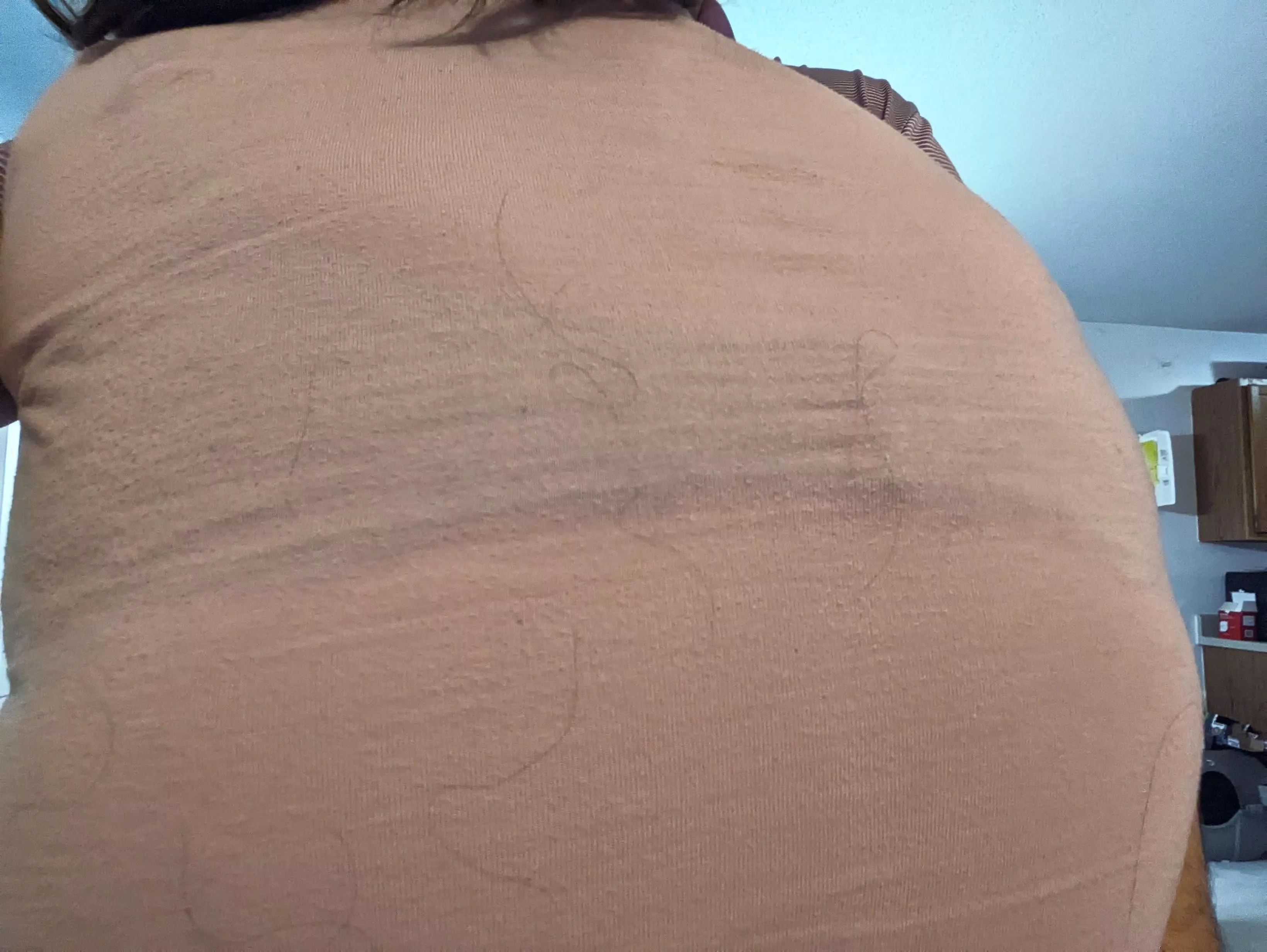 She loves wearing dark bras under light shirts because she knows what it does to me