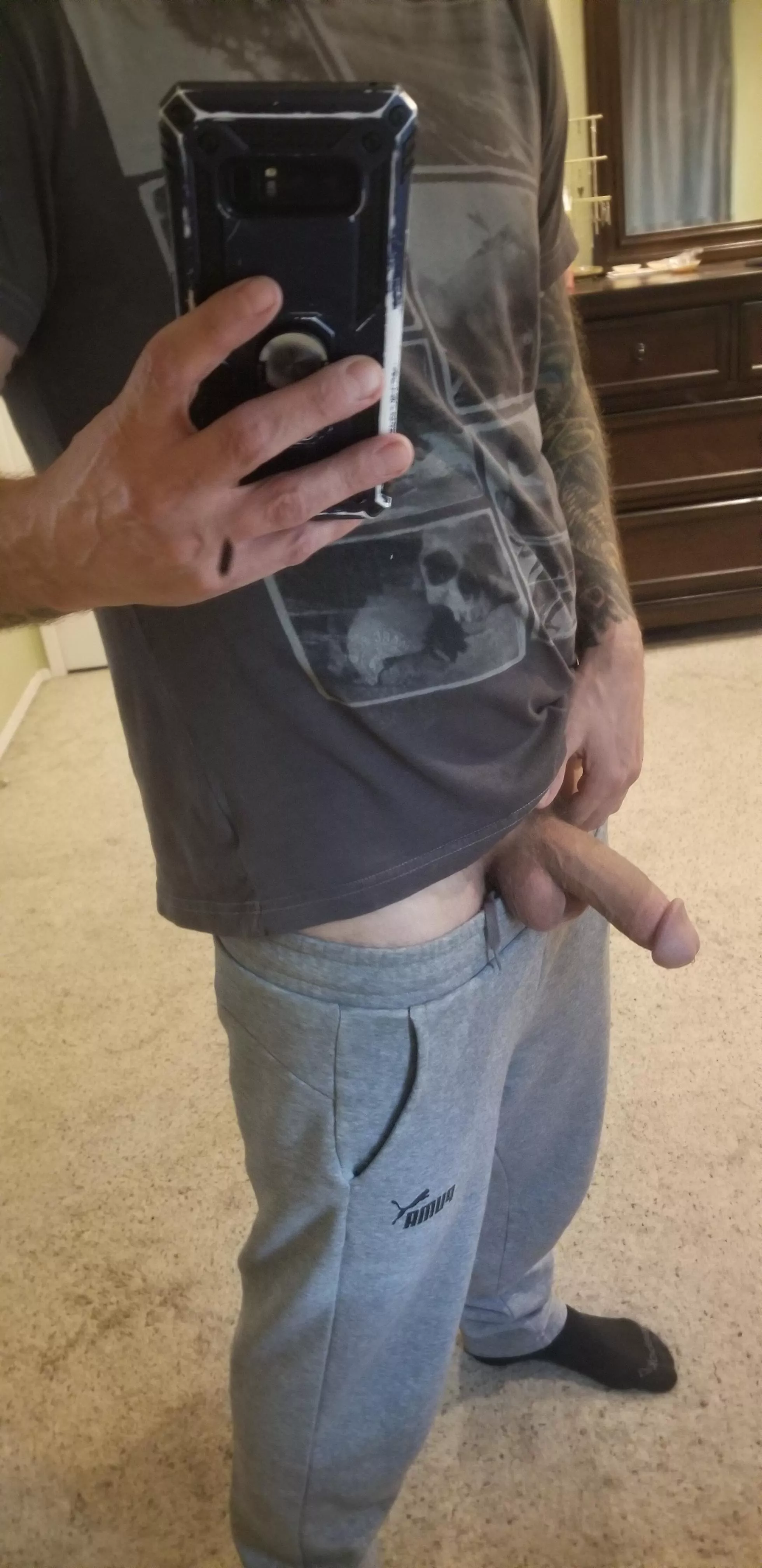 [42] Whats behind the bulge in these gray sweat pants
