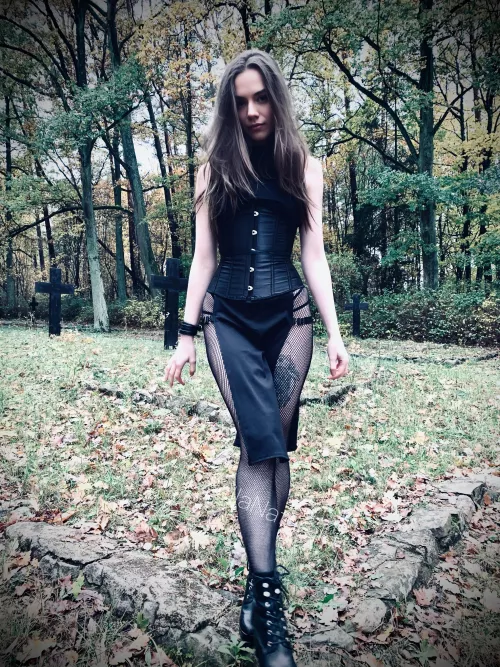 It’s a super tight corset and dress cut on sides all in Halloween style