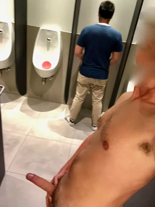 boner at the urinals- does he mind ?