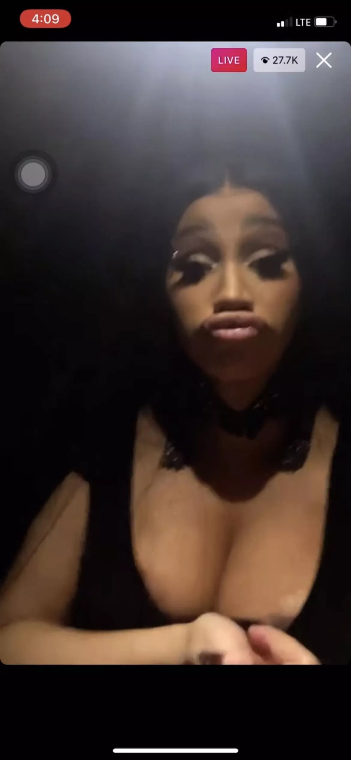 Cardi pouting