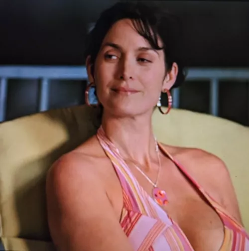 Carrie Anne Moss's post baby cleavage