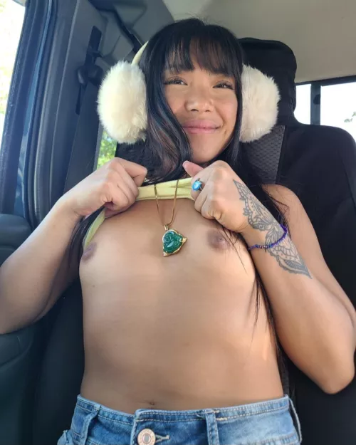 i love being in the car with my tits out and exposed