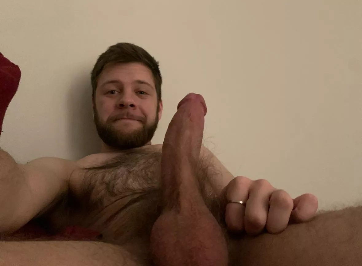 in bed with a hard dick and chesthair out. 🤤