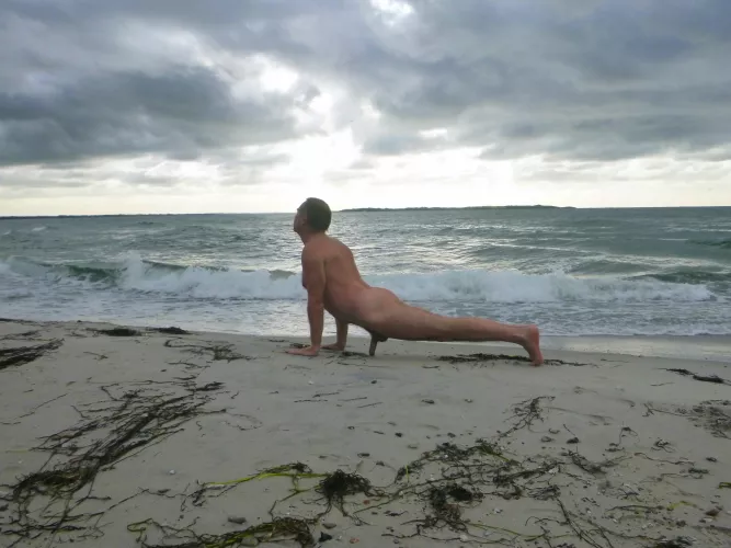 Upwardfacing dog on the beach