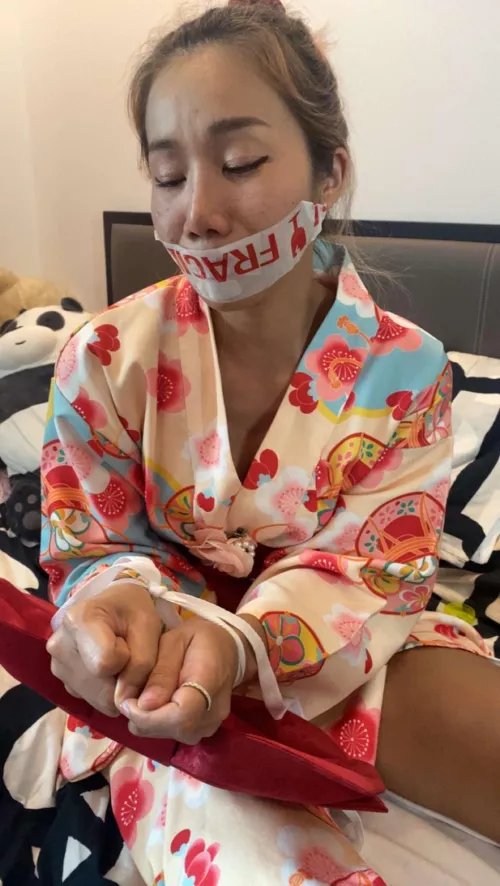 Asian Lady Tape Gagged