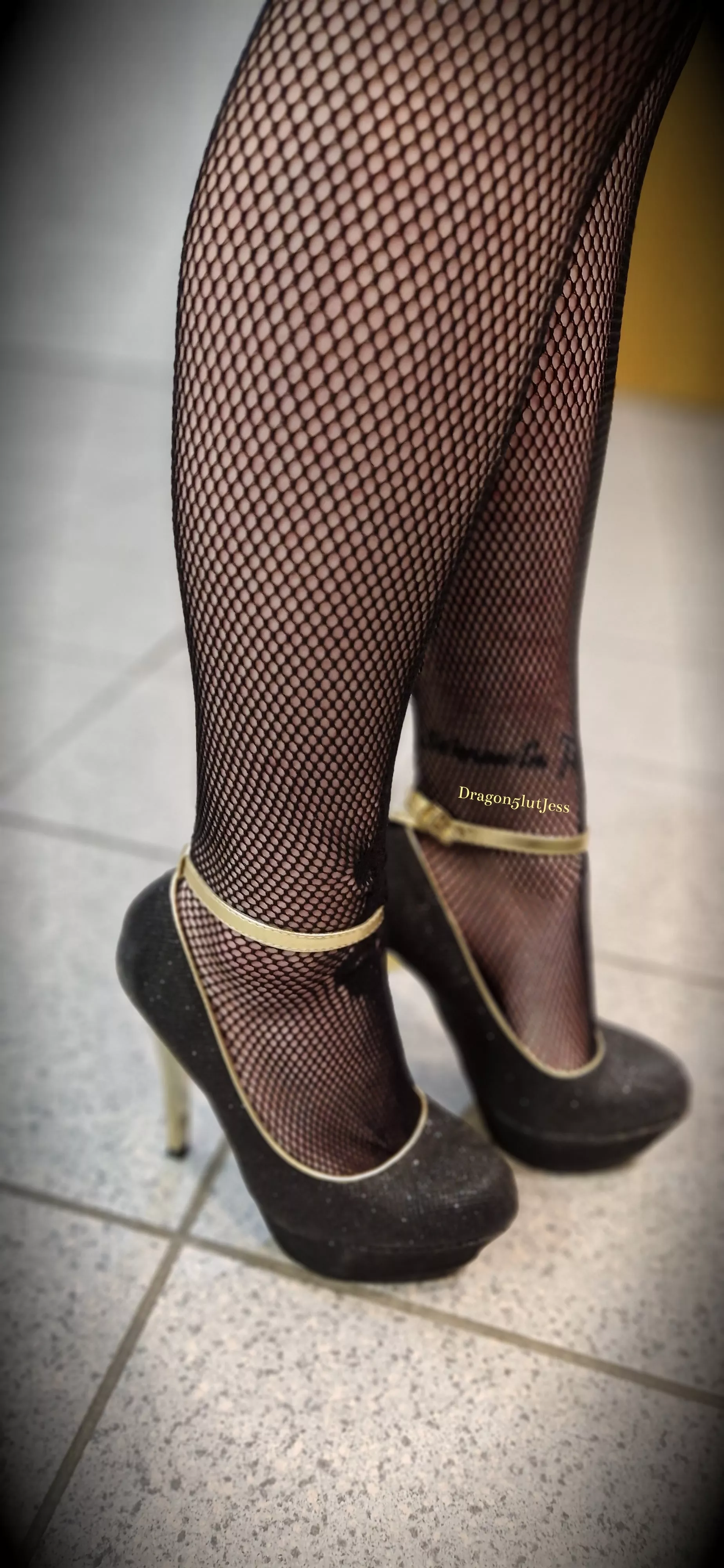 Black stockings go so well with these gorgeous heels