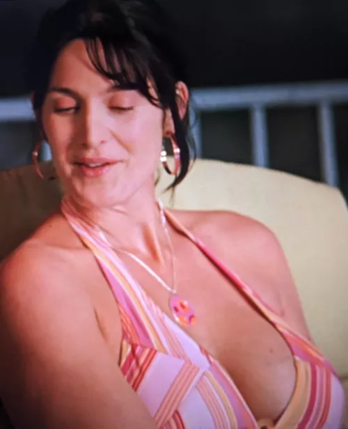 Carrie Anne Moss's post baby cleavage