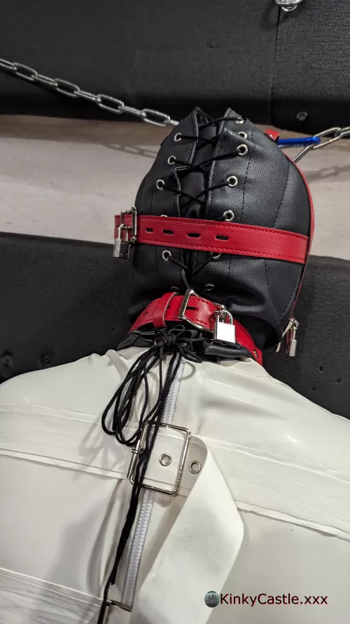 Padlocked in a sensory deprivation hood, with a latex straightjacket. [OC] [NB] [CC-SA]