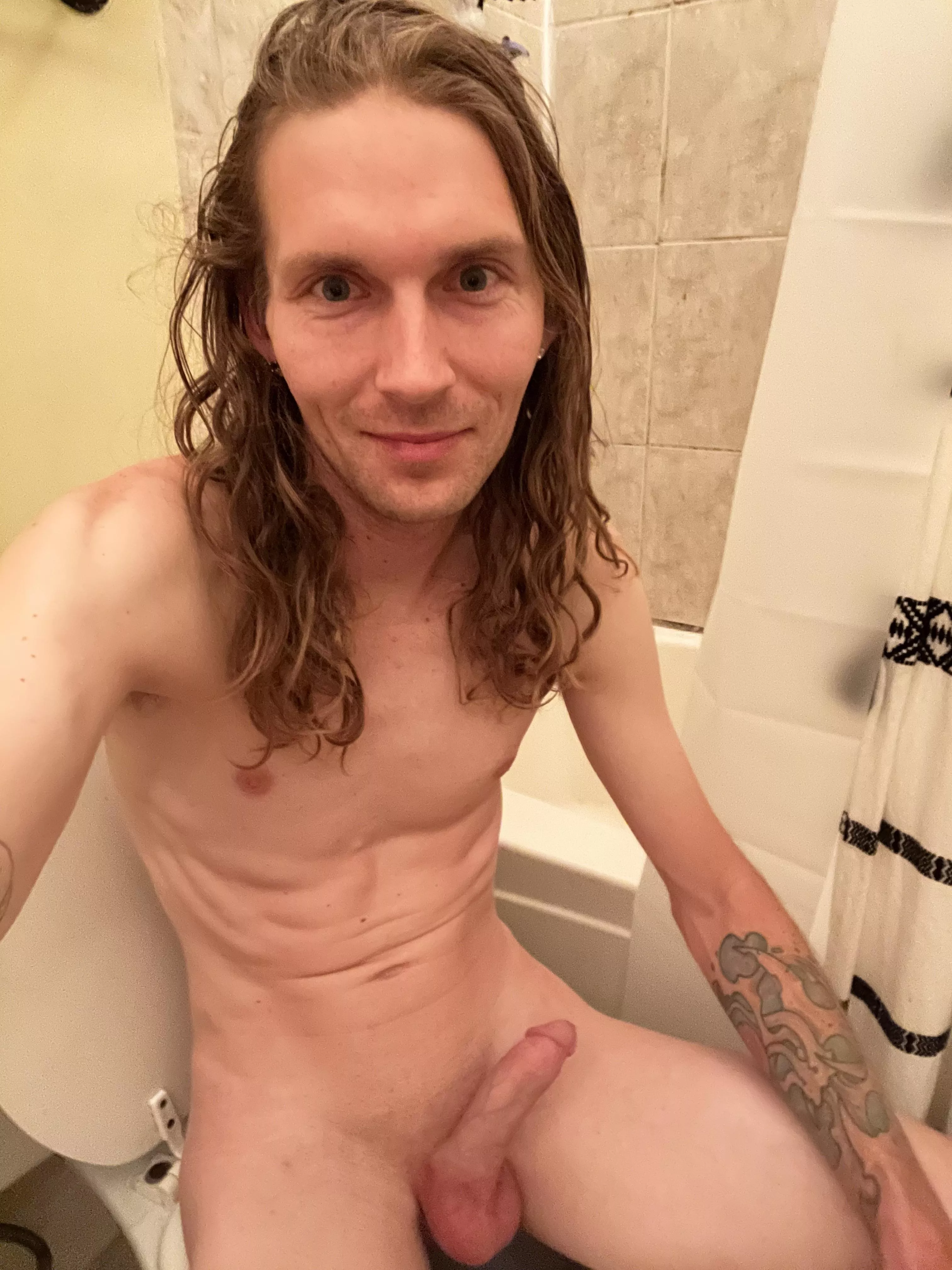 Cute long hair guy with tattoos