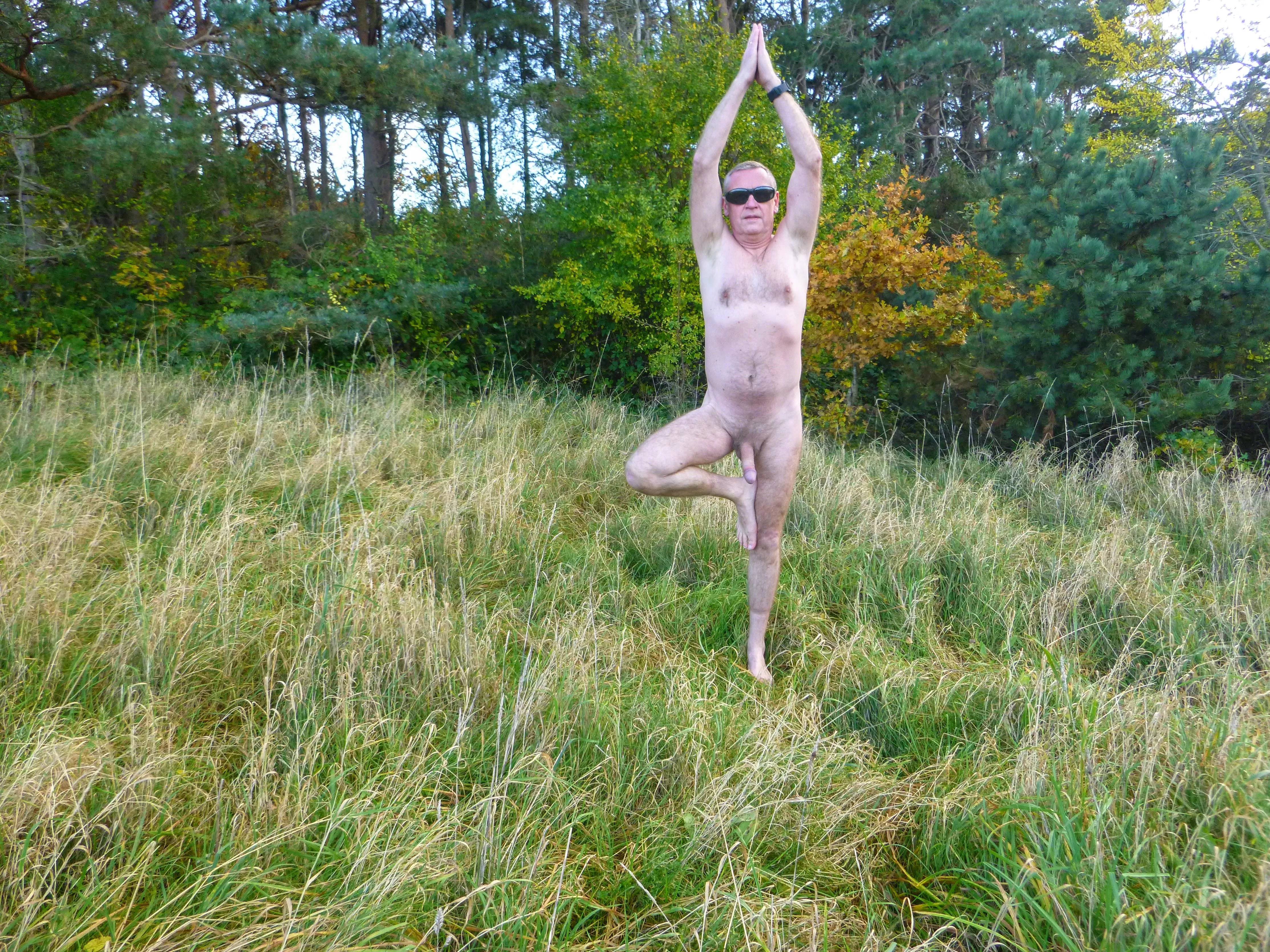 posing among the trees - but I think the no leaves gives me away