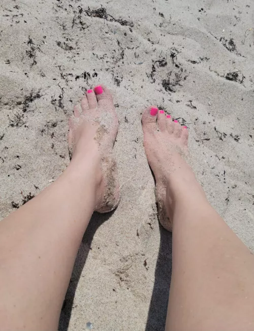 My feet enjoying the sandy beach.