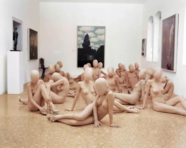 Nude girls grouped together in a somewhat disturbing way