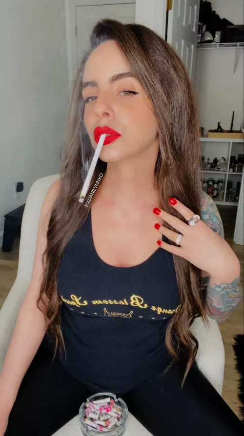 Beautiful red lips with an all white cigarette 💋💨