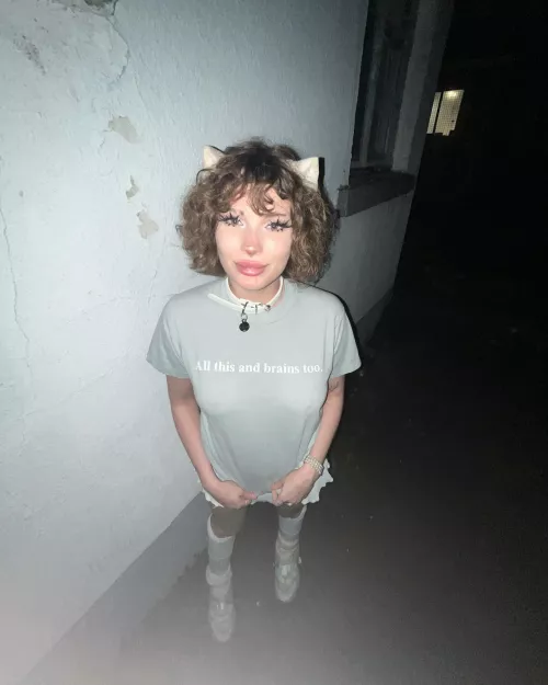 collared kitten outside :3