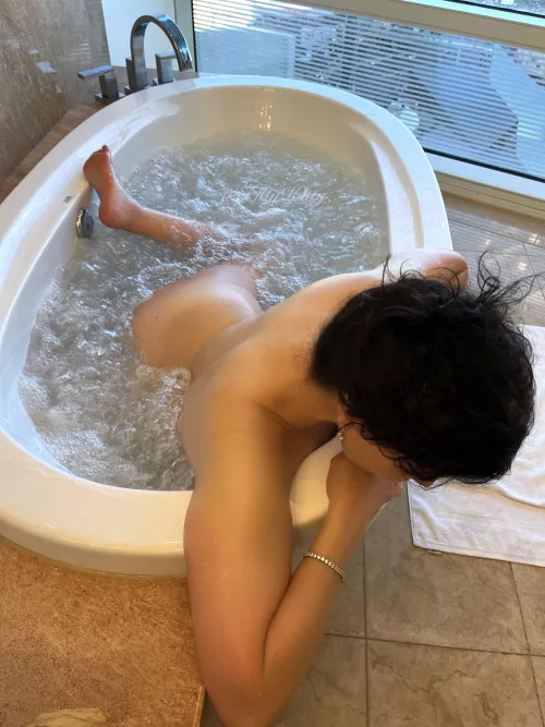 Luxuriating in a spa bath… [f]