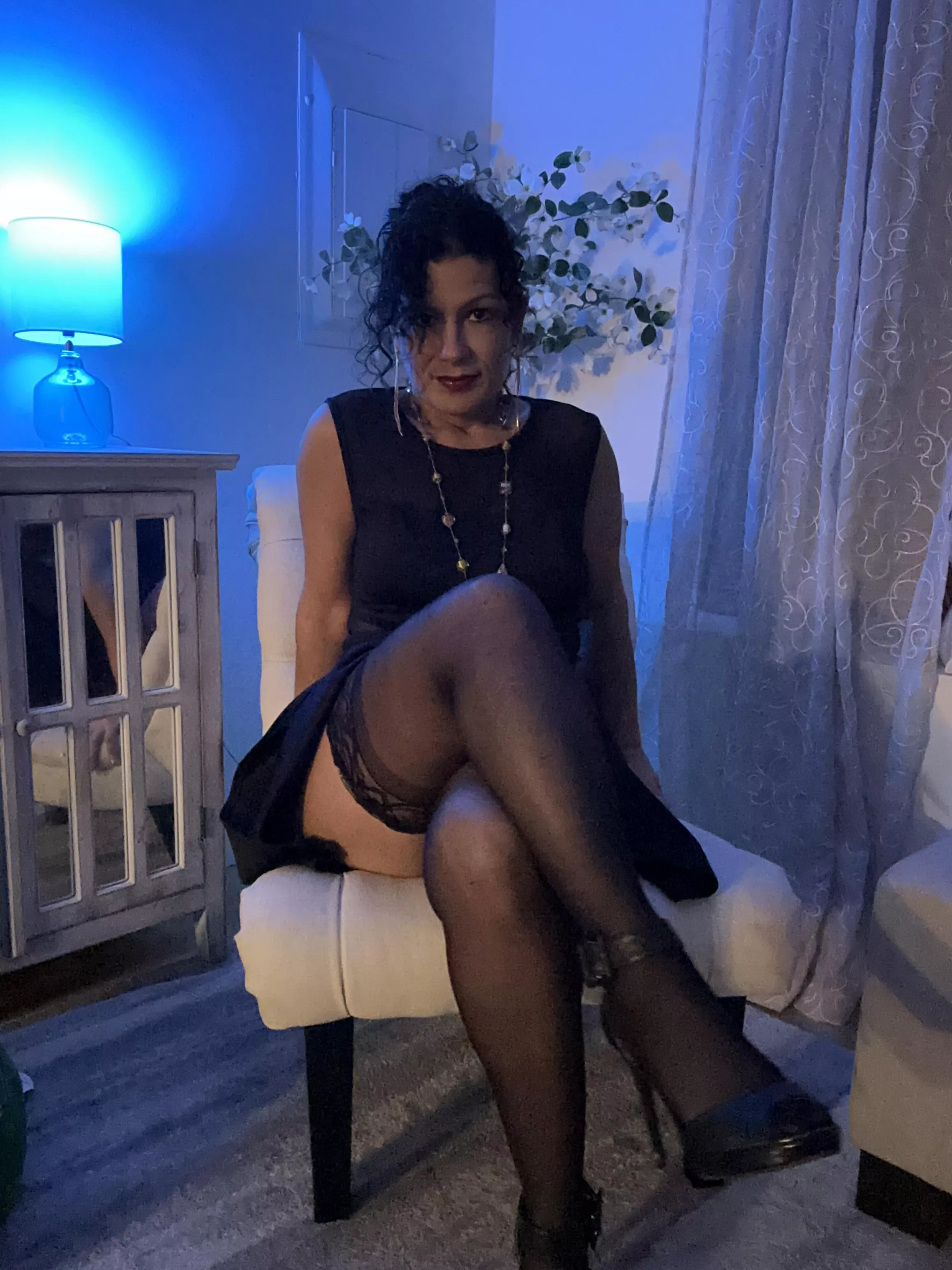 Thigh highs make this brunette look more sophisticated.