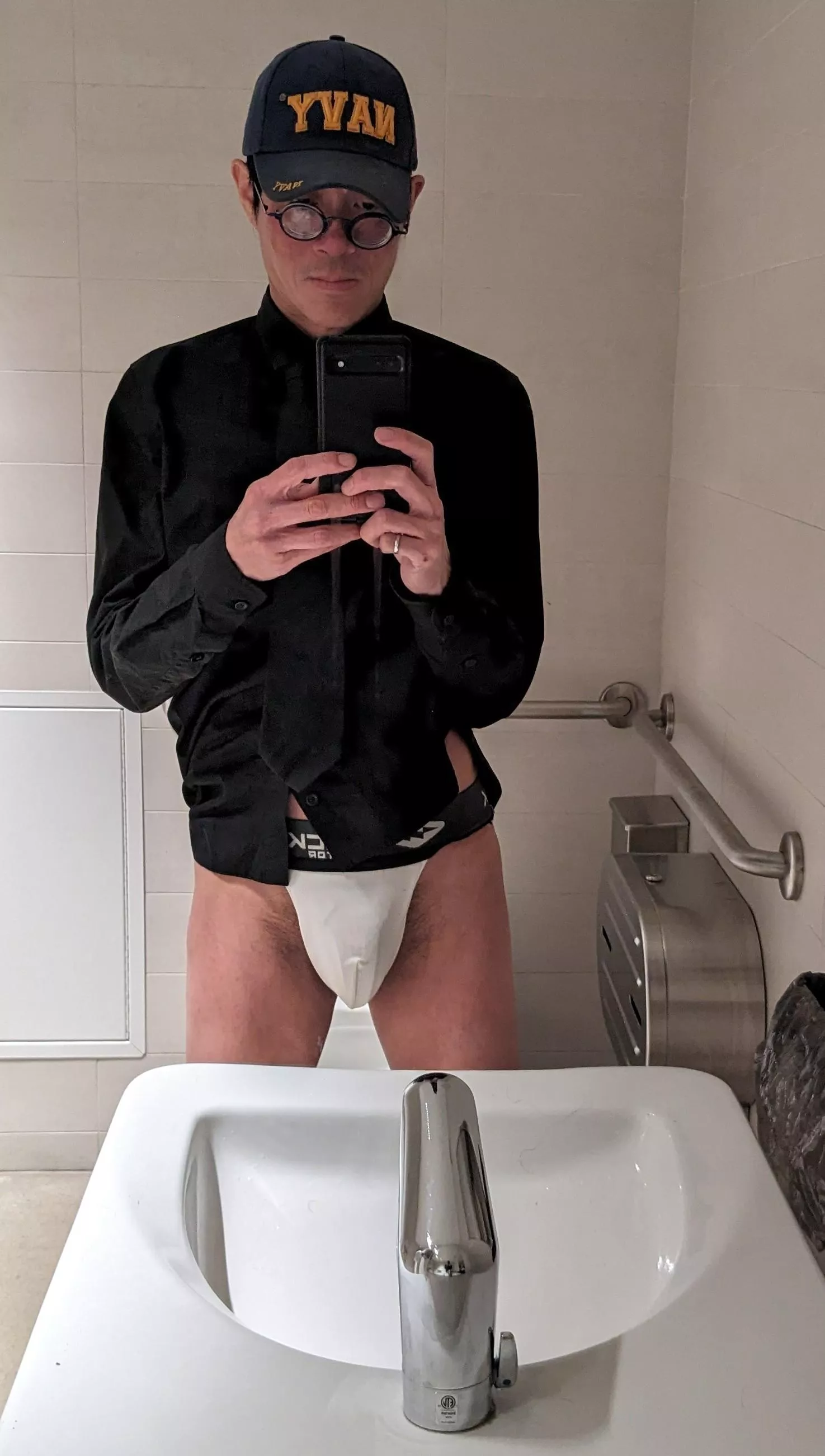 Black shirt and tie.