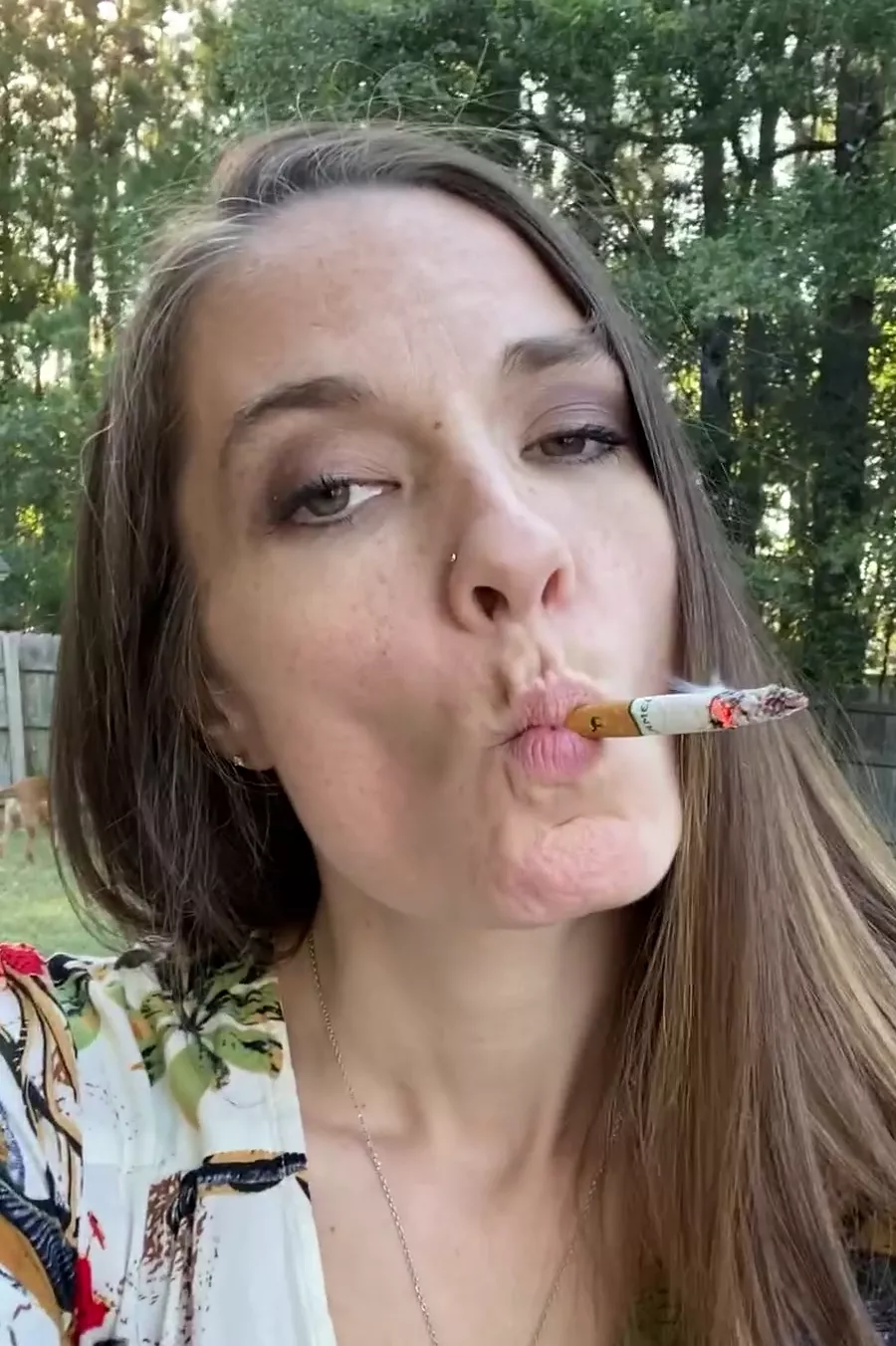 I honestly think I am the most addicted woman in the world. I've been chain smoking all day, my lungs are numb, but I can't stop myself from lighting another cigarette.