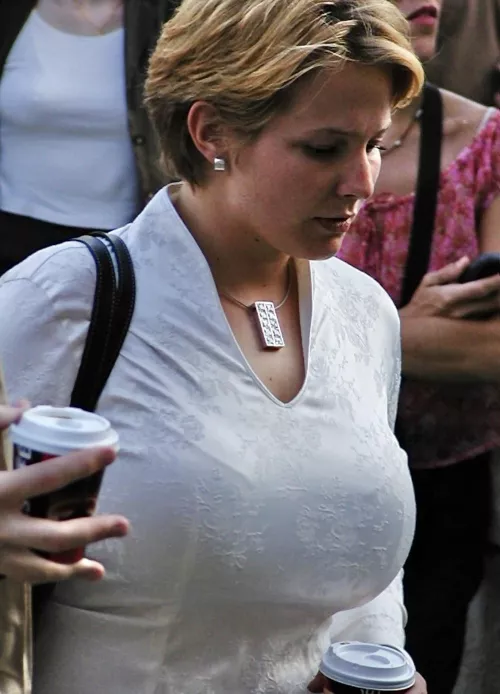 Busty Blond with Big Tits in a tight Satin Top