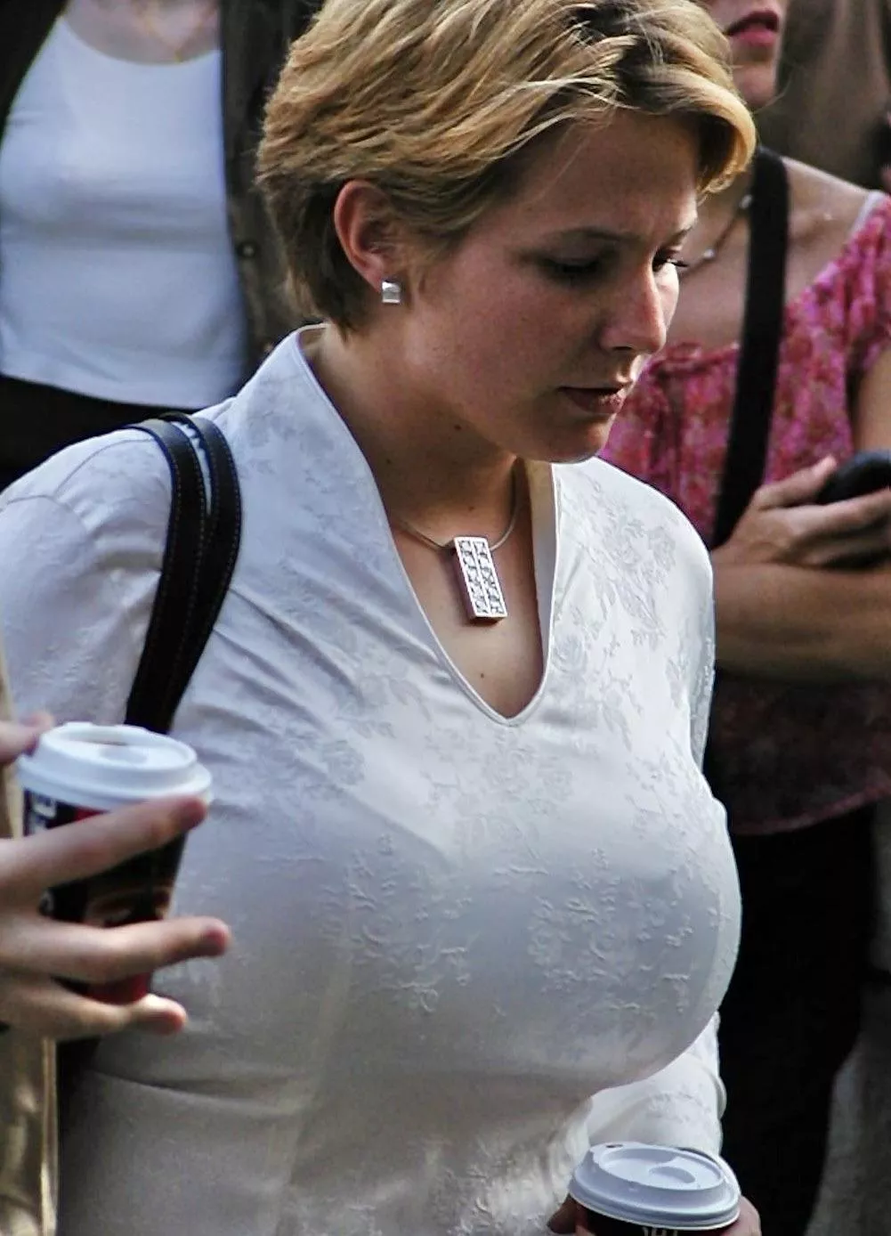 Busty Blond with Big Tits in a tight Satin Top