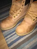 I made a post a few weeks ago about having spot cleaned my Timbs and having spots. Turns out that they were just due to get cleaned, and once I cleaned them all over, the colour evened out. Hope this helps.