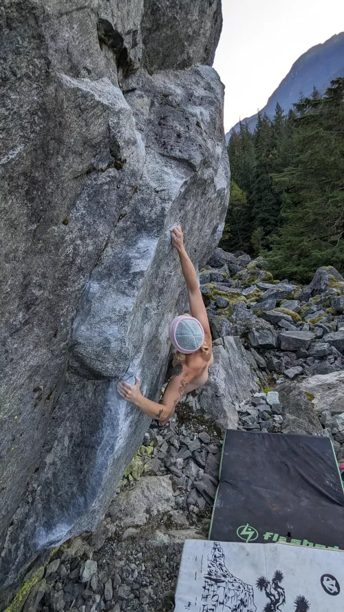 Naked rock climber