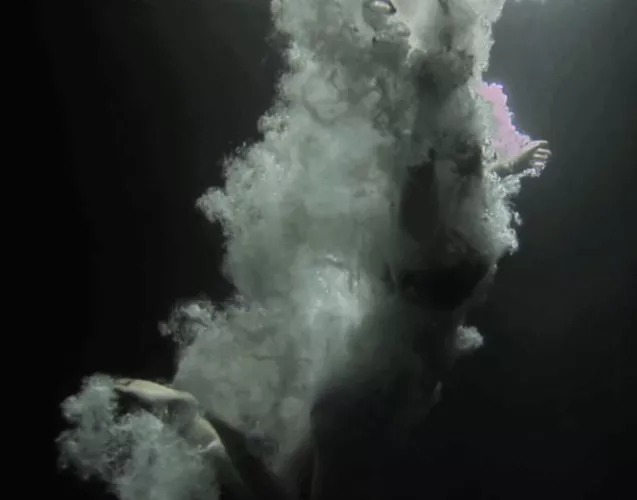 A pic of me jumping into the ocean one night in the moonlight