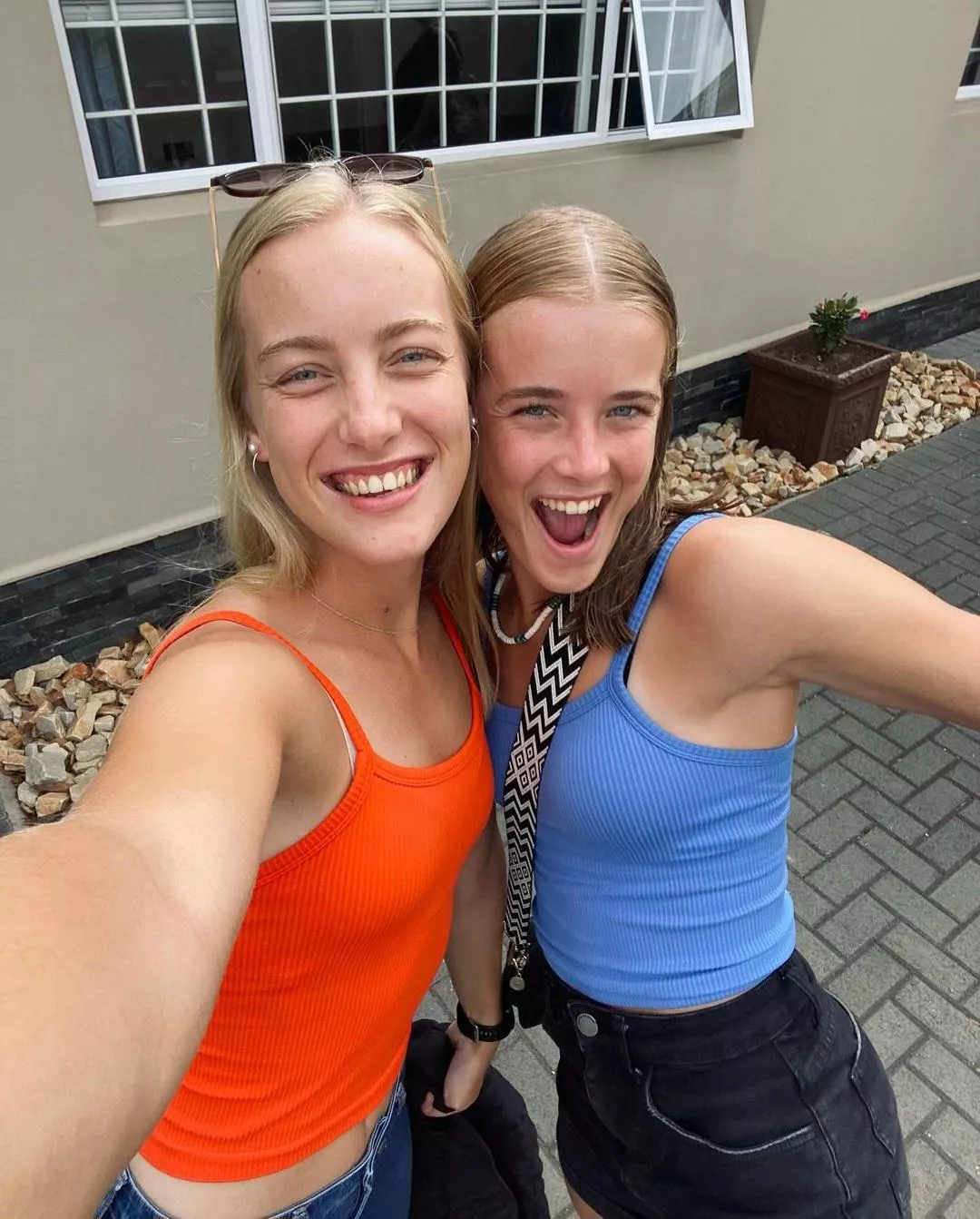 sisters' beige & black bra straps. (18+)