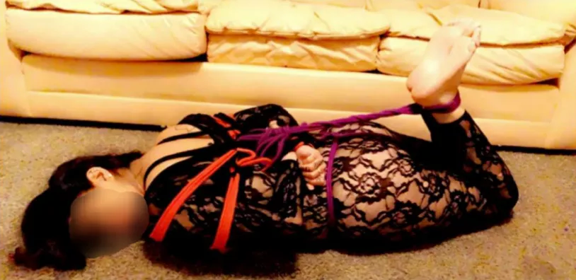 Tied up in a full body suit! This was a fun night