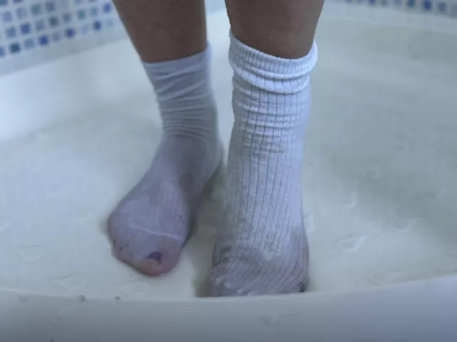 Wet white ankle socks