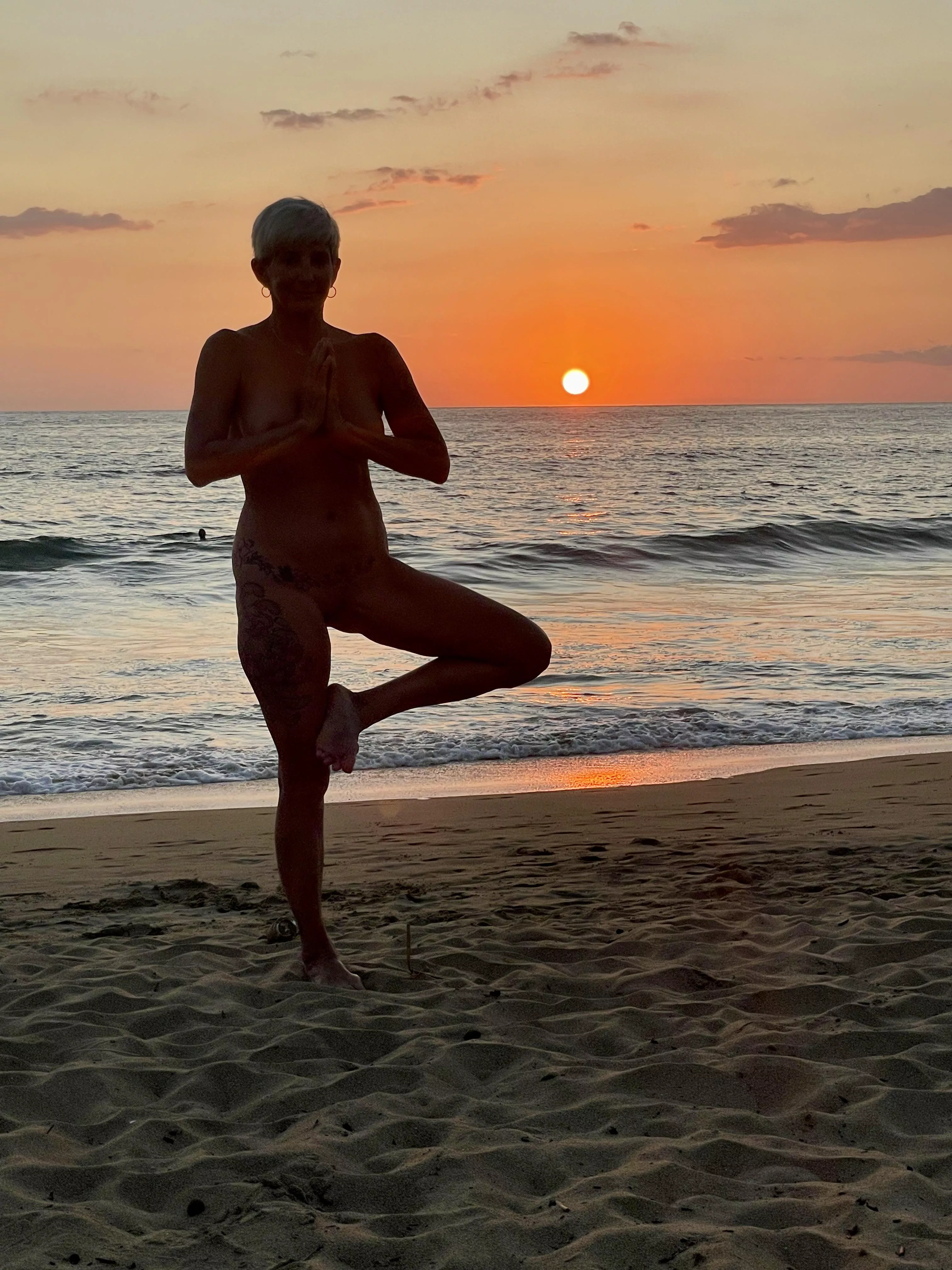 Beach, sunset, naked yoga…perfect