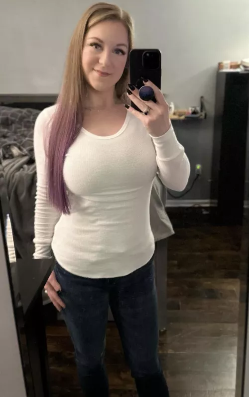 Big sweater puppies aren’t the only big things she hides…