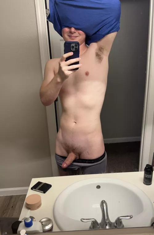 Taking the shirt off. Pms open
