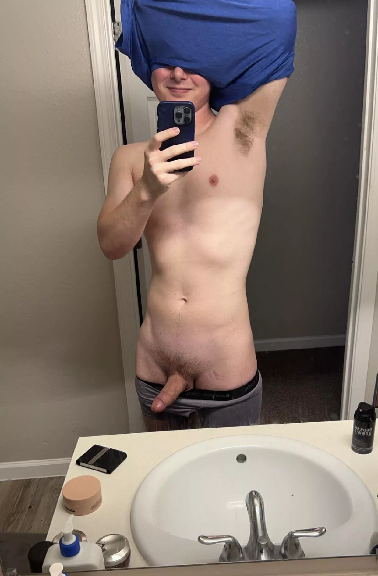 Taking the shirt off. Pms open