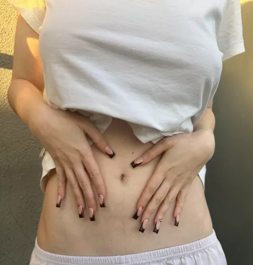 The great feeling of touching my skin with the tip of my new nails!