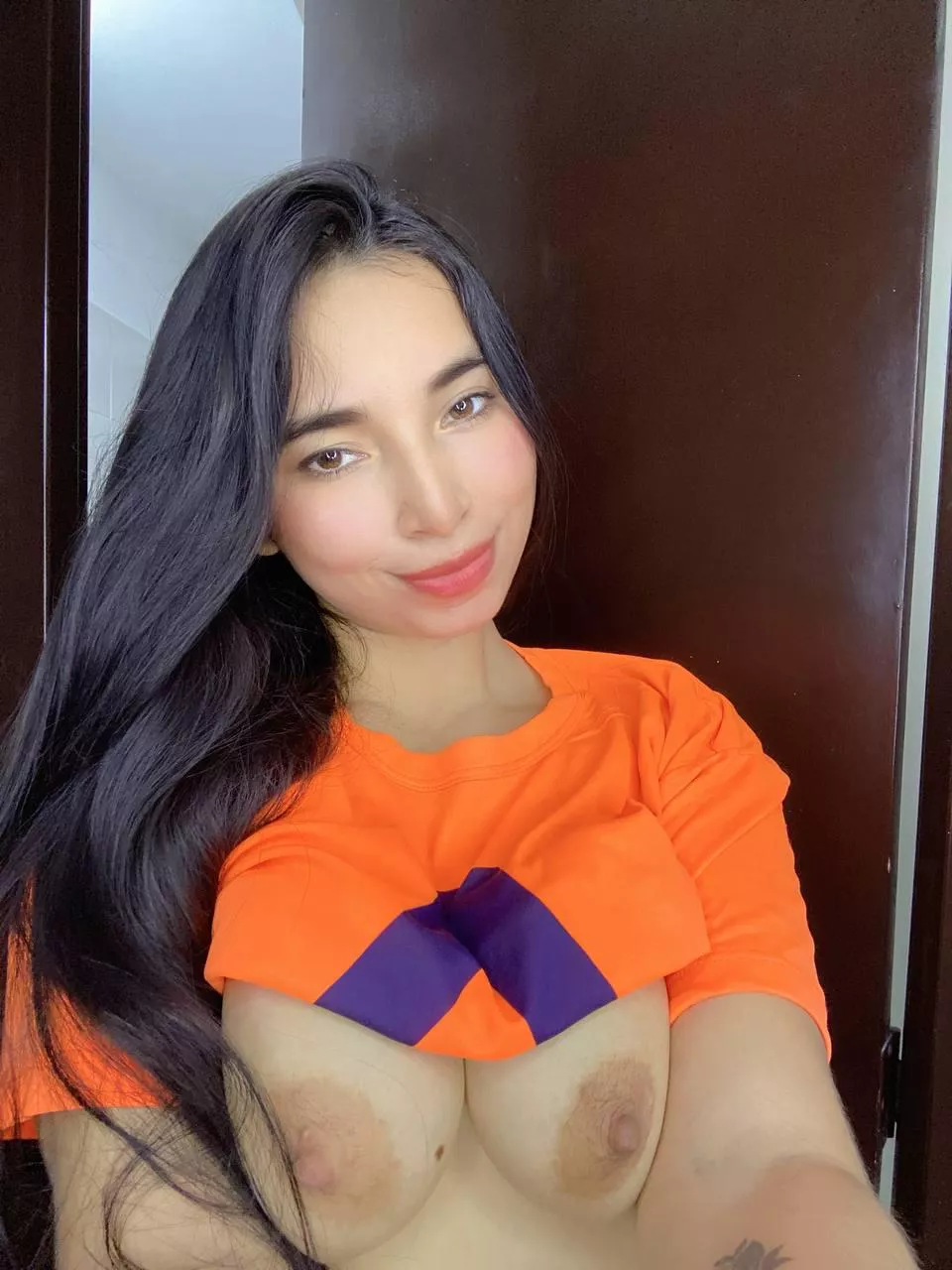 Sweet Asian with busty natural smile