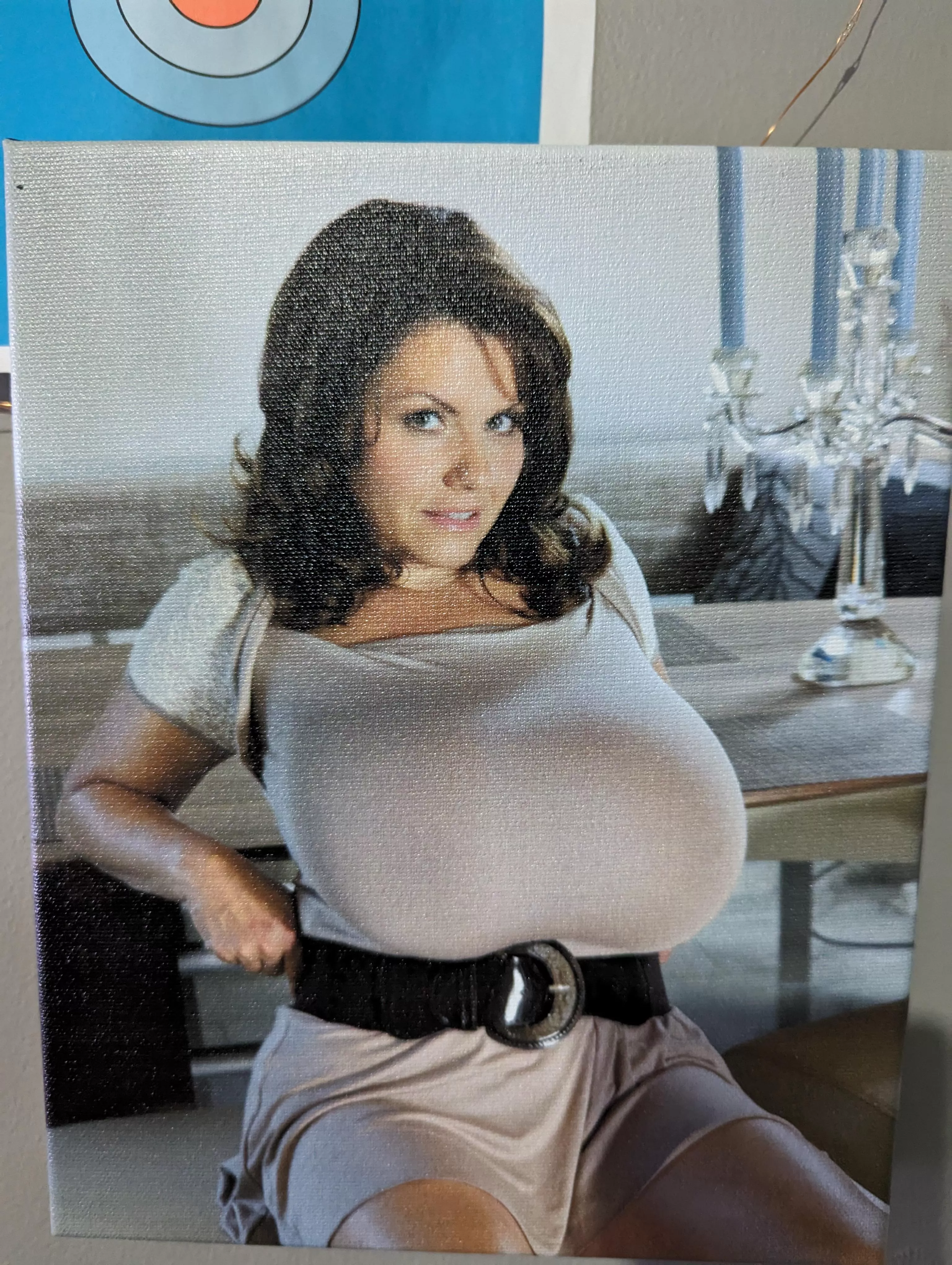 You can get photos on a canvas print through Google photos!