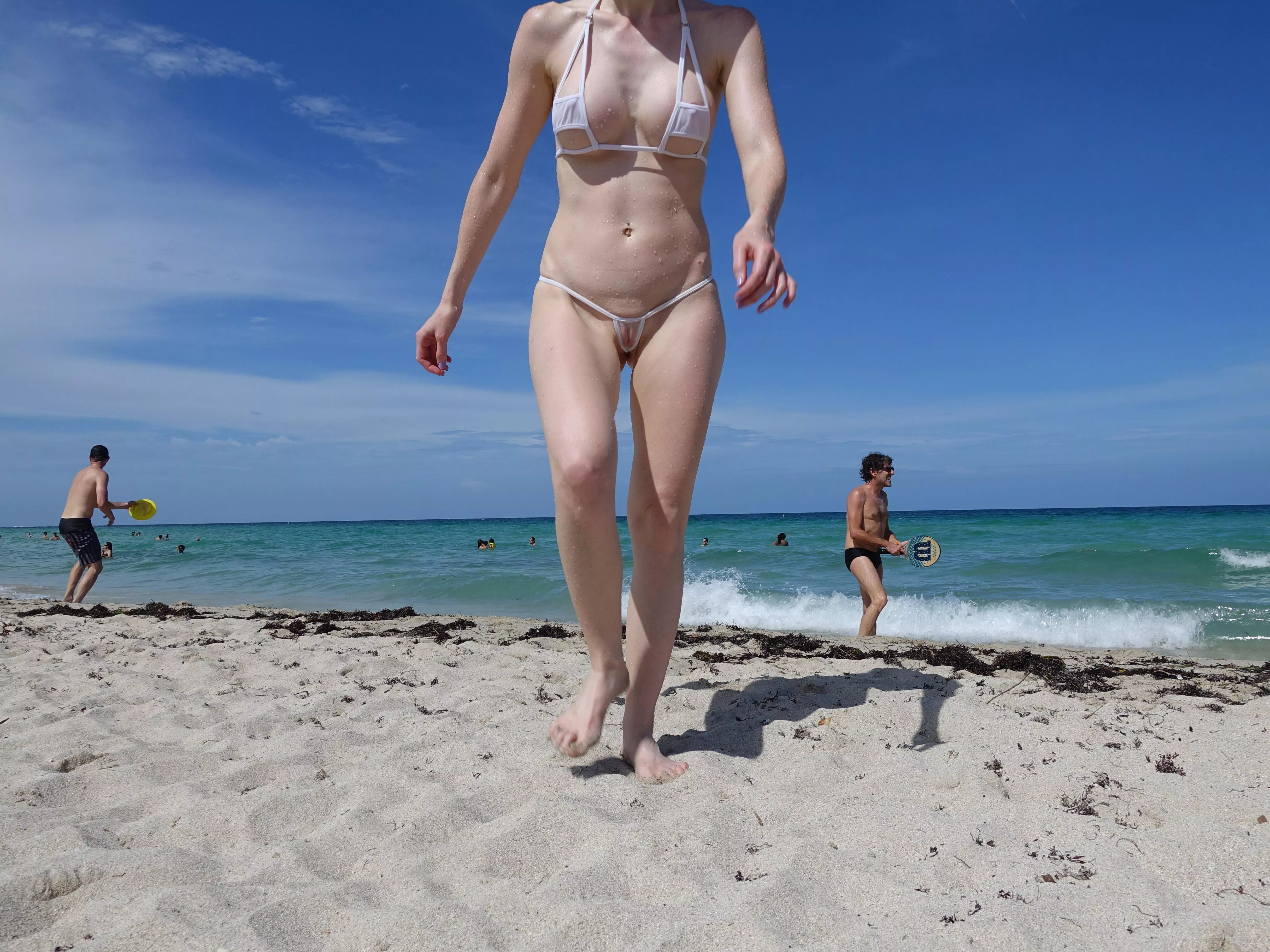 At the beach with a minimalist bikini