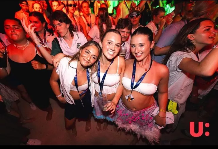 Best friends at a nightclub.