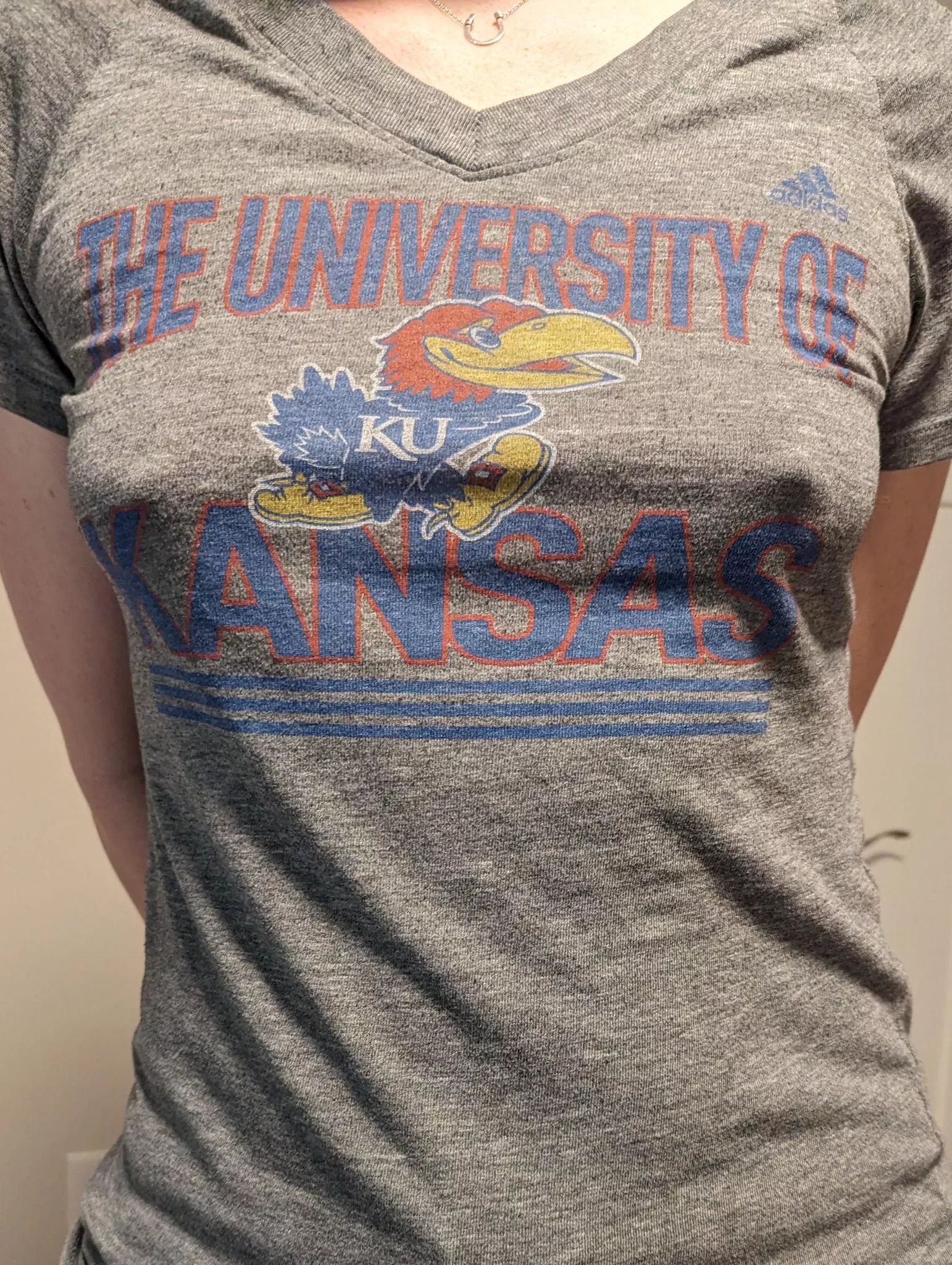 Braless in my Jayhawks shirt.