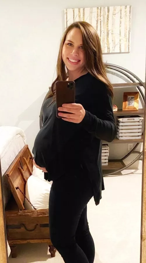 Clothed pregnant belly