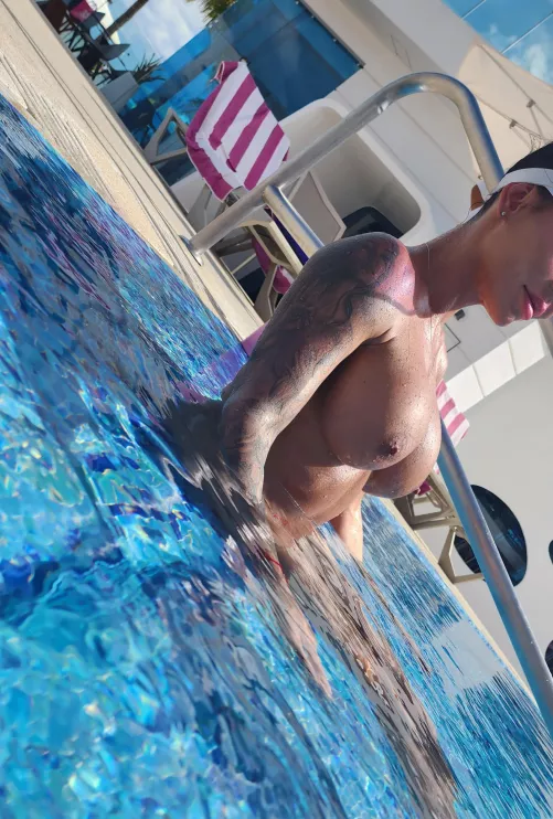 Just sitting on the pool edge giving the guys here a view to get them hard and not able to leave the water