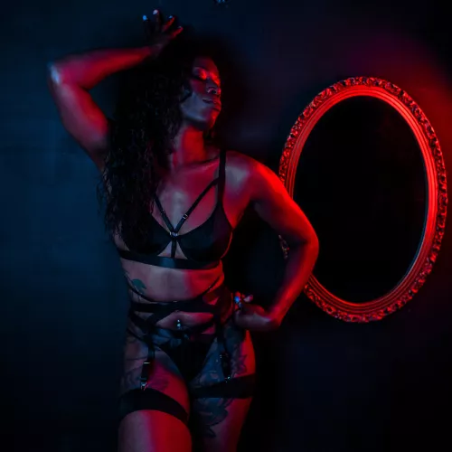 Ms. S in black lingerie.