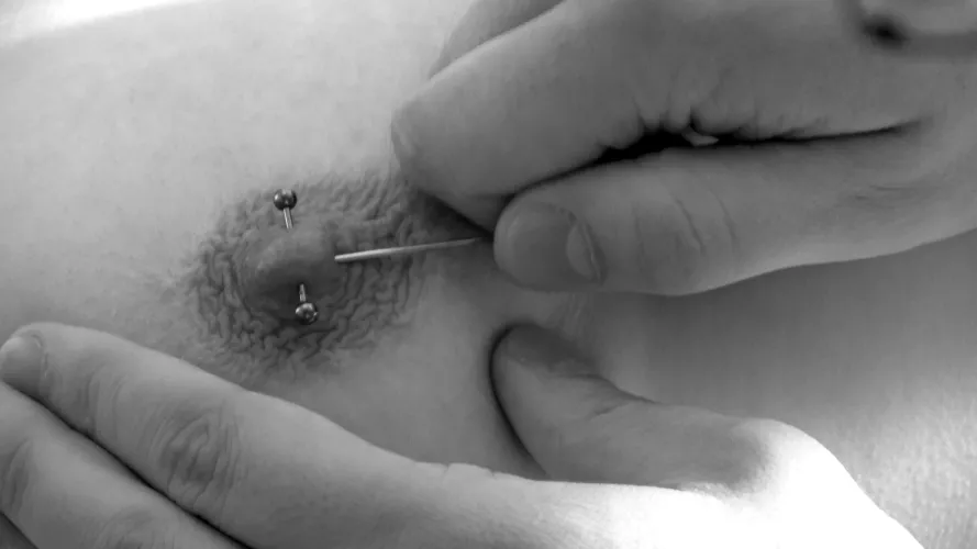This is me getting my pierced nipple pierced again